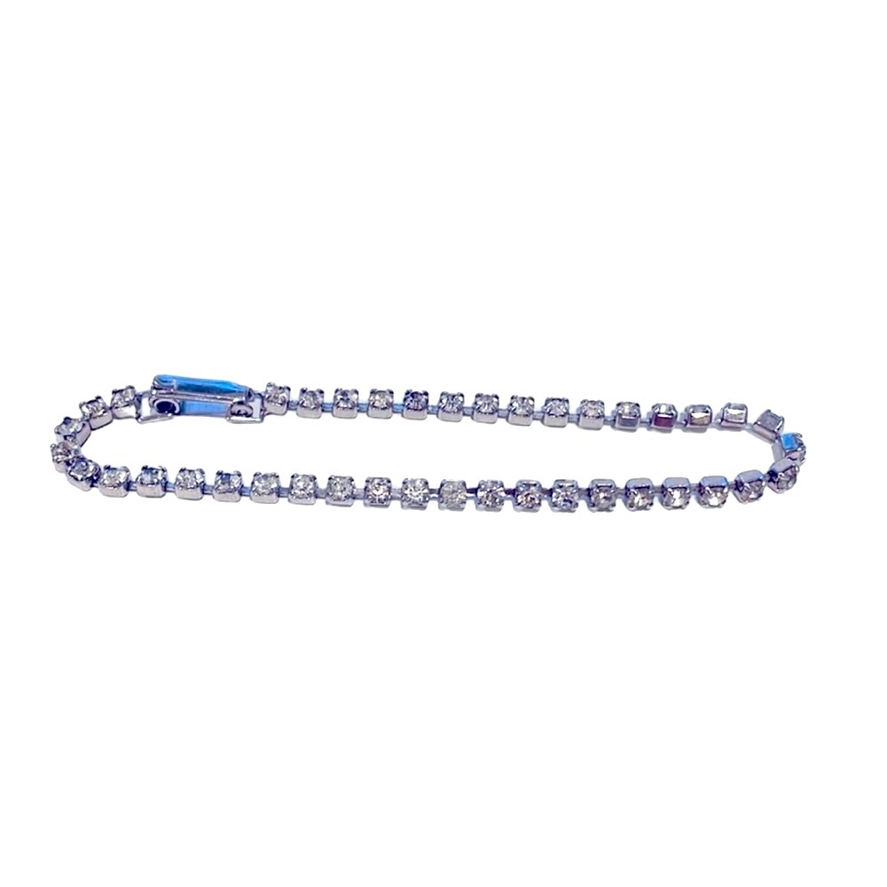 Vintage rhinestone beaded tennis bracelet. Clasp closure.